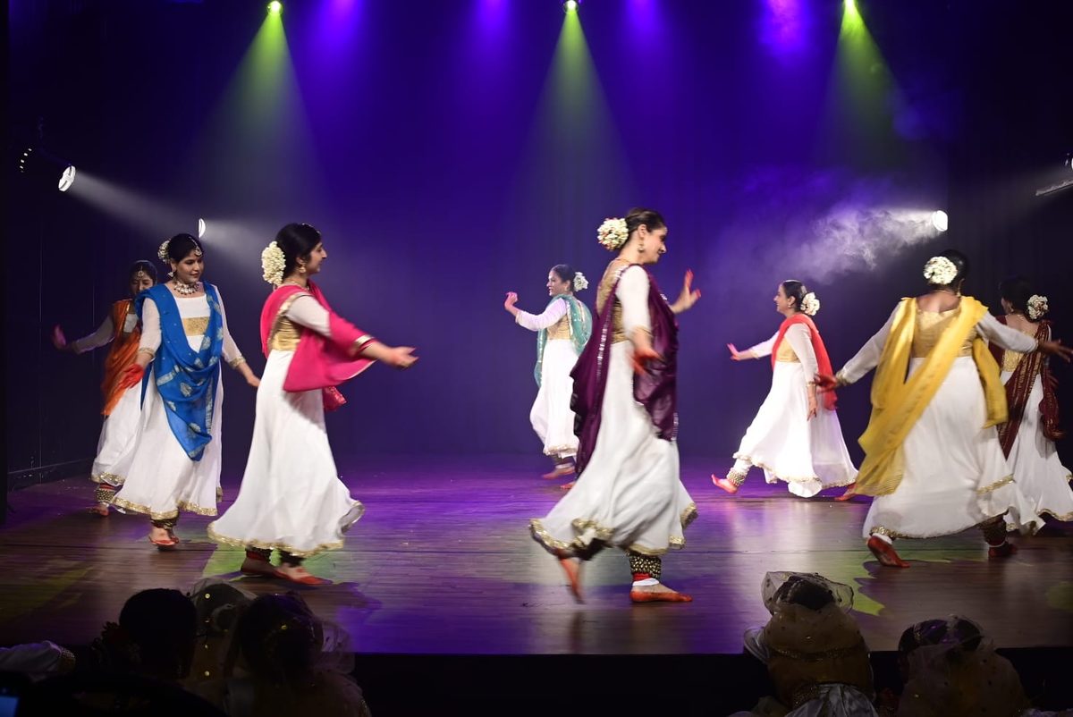 Senior Kathak students performing on stage