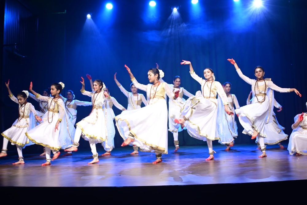 NrityaShrm students performing Kathak on stage