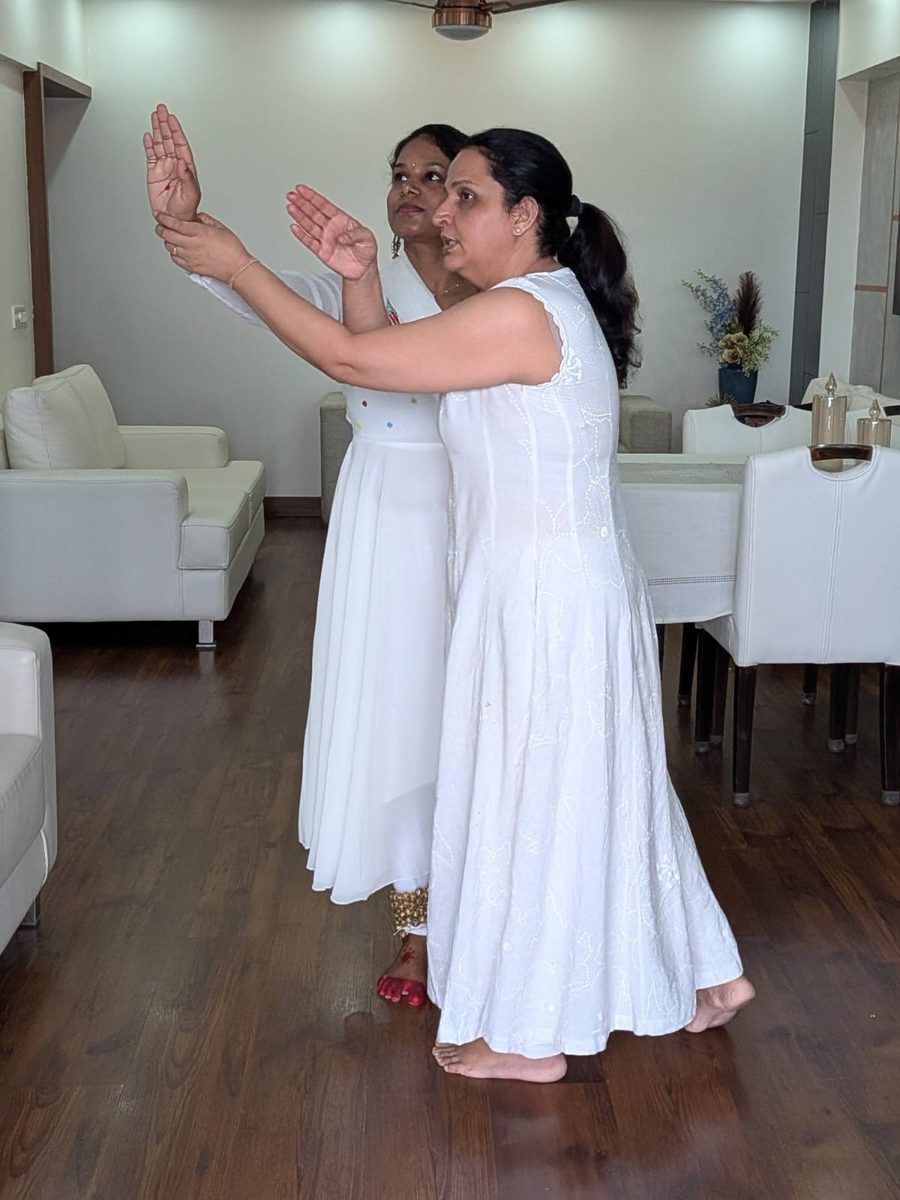 Shalu teaching an adult Kathak student