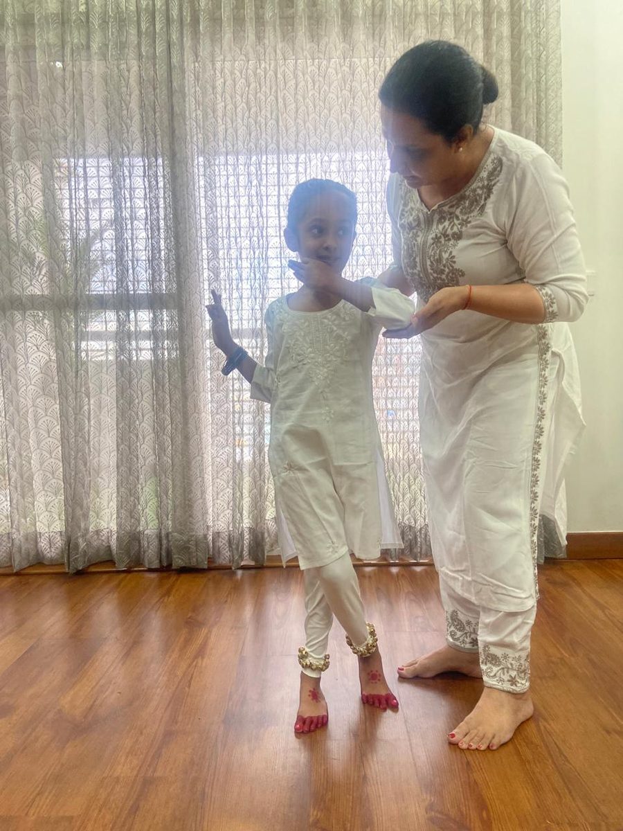 Shalu teaching a young Kathak student